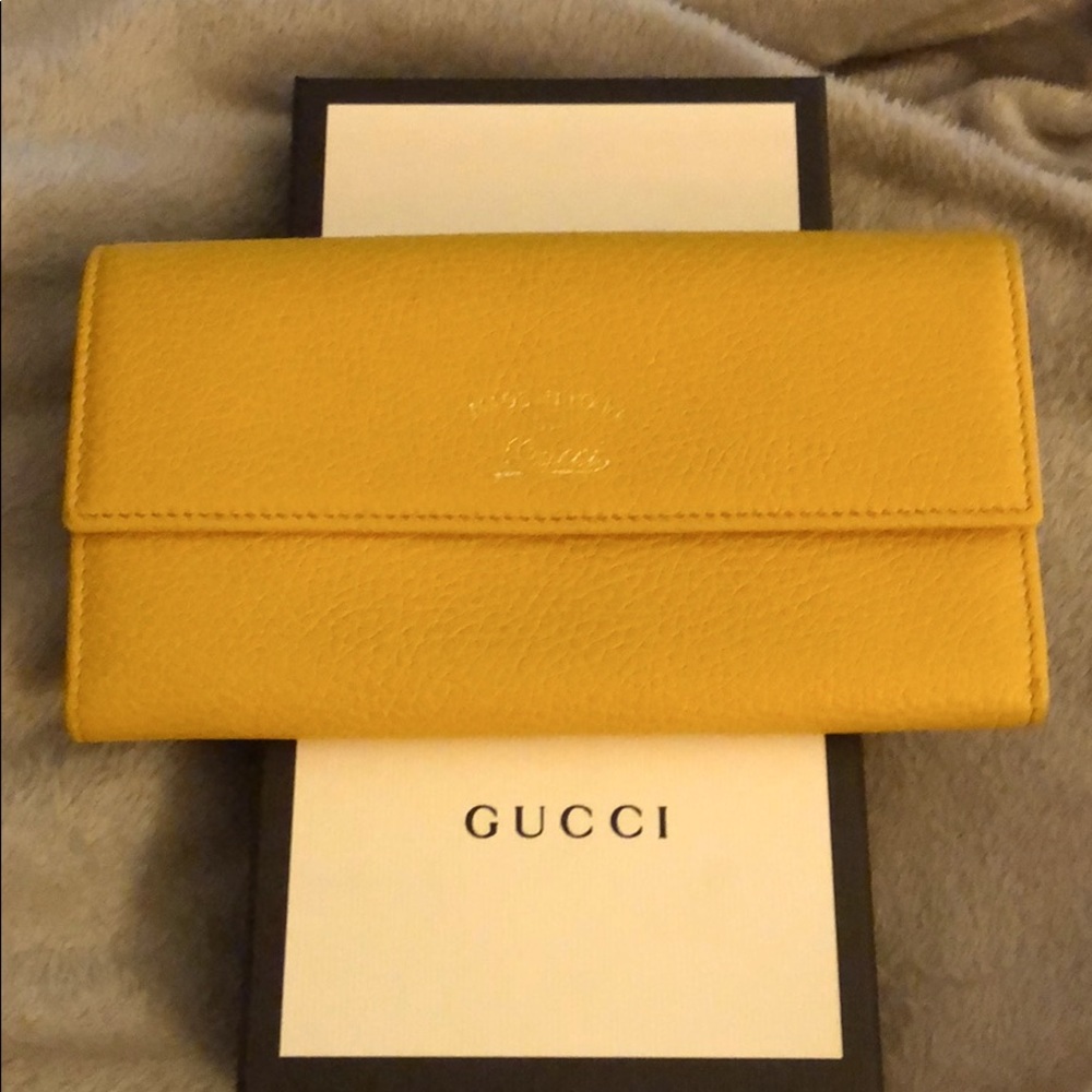 Gucci - GREAT condition yellow full size wallet!